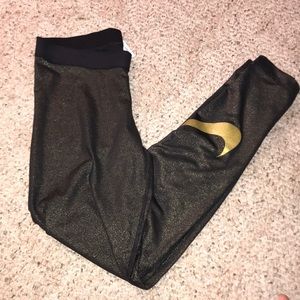 grey and gold nike leggings